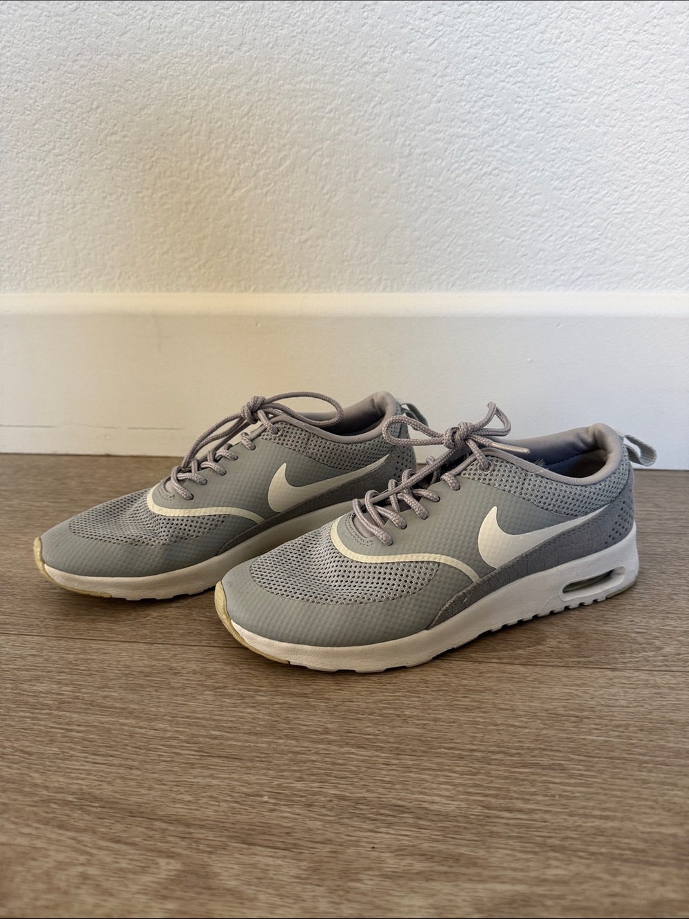 Nike Women’s Thea Light Gray and White Low-Top Sneakers size 7